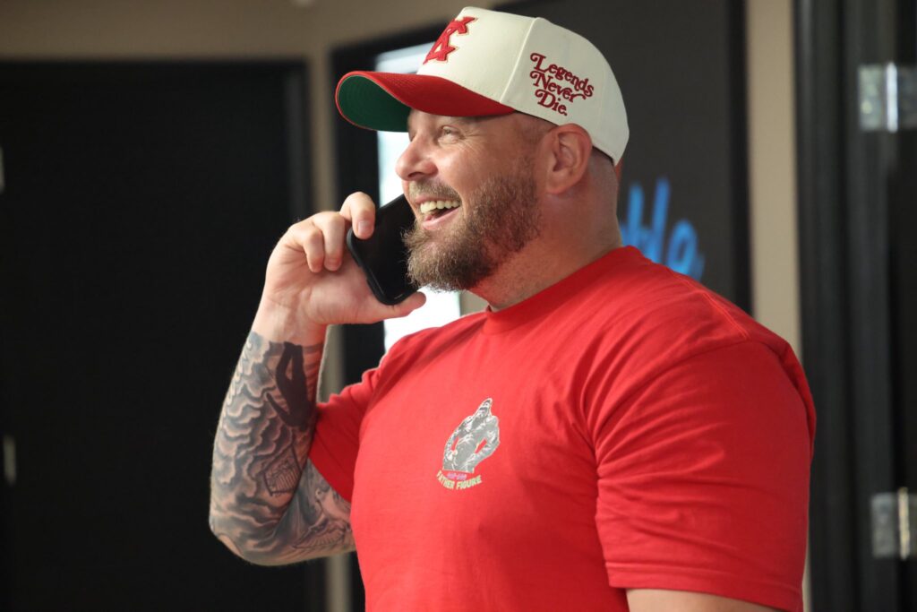 Jon Gear speaking with a client by phone